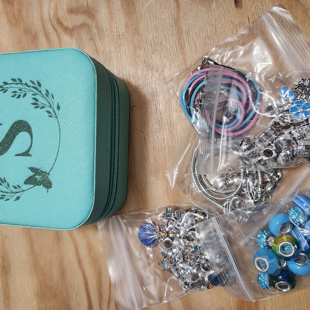 Teal Jewelry Organizer with Assorted Charms
